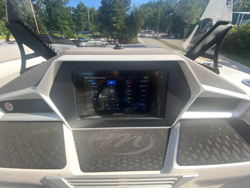 Slide: The Image of Dashboard of a 2020 Manitou 25 Legacy SHP DL with Garmin GPS display. - 20