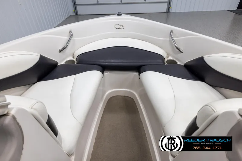Slide: The Image of Interior of 2002 Tahoe Q3 I/O boat with white and black seating. - 14