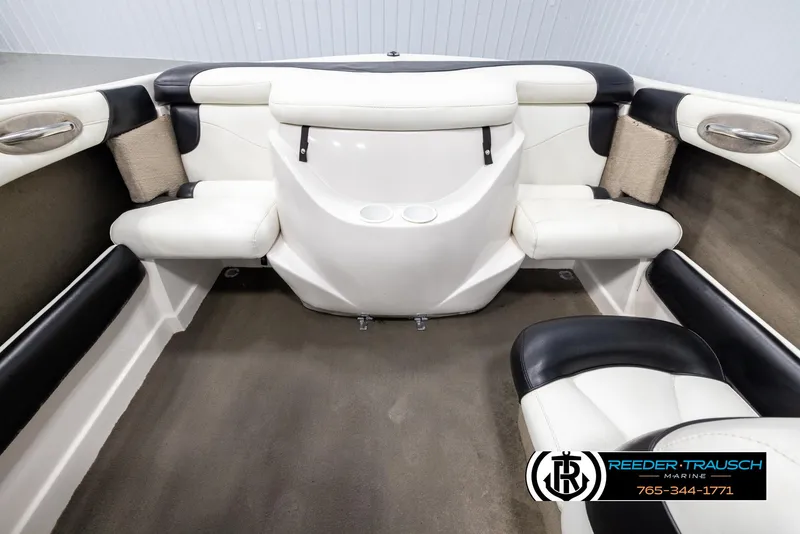 Slide: The Image of Interior of 2002 Tahoe Q3 I/O Mechanical Special boat with white and black seating. - 17
