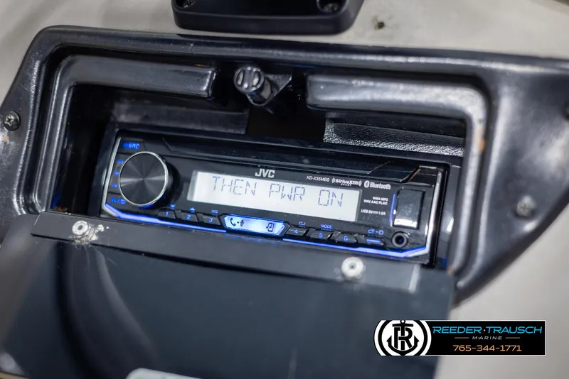 Slide: The Image of JVC stereo system in a 2002 Tahoe Q3 I/O Mechanical Special boat dashboard. - 20