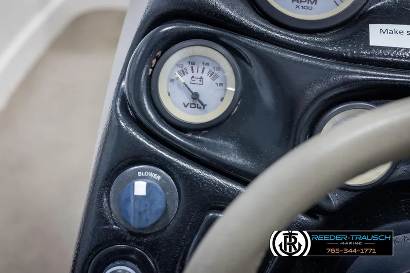 Slide: The Image of Close-up of 2002 Tahoe Q3 I/O dashboard with voltmeter and blower switch. - 26