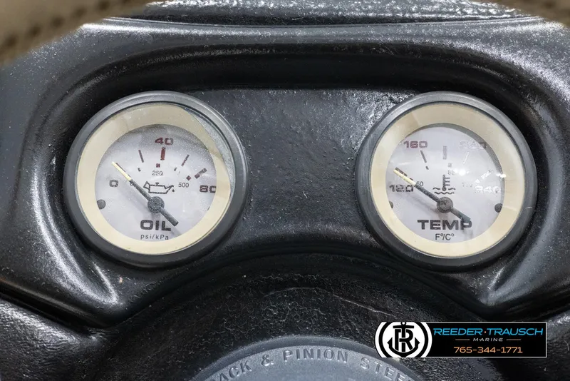 Slide: The Image of Close-up of oil and temperature gauges on a 2002 Tahoe Q3 I/O Mechanical Special. - 29