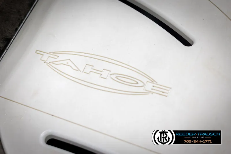 Slide: The Image of Close-up of 2002 Tahoe Q3 I/O Mechanical Special logo on white surface. - 36