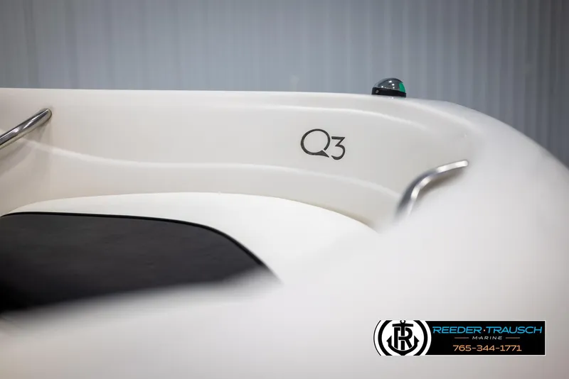 Slide: The Image of 2002 Tahoe Q3 I/O Mechanical Special boat interior with logo and railing detail. - 37