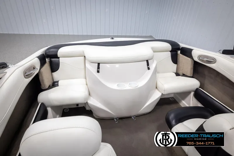 Slide: The Image of Interior of a 2002 Tahoe Q3 I/O boat with white and black seating. - 38