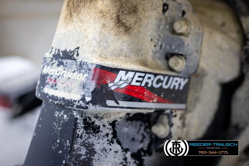 Slide: The Image of Close-up of a weathered Mercury MerCruiser engine part on a 2002 Tahoe Q3 I/O. - 43