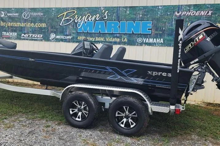 The Image of 2026 Xpress H20 Bass boat on trailer at Bryan's Marine dealership. - 0