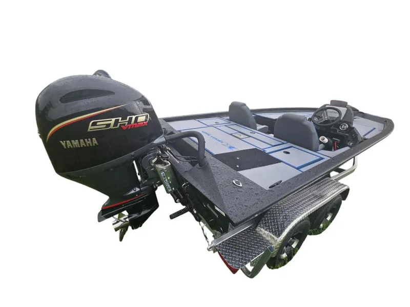 Slide: The Image of 2026 Xpress H20 Bass boat with Yamaha SHO VMAX engine on grass. - 13