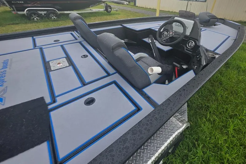 Slide: The Image of 2026 Xpress H20 Bass boat interior with modern dashboard and seating. - 15