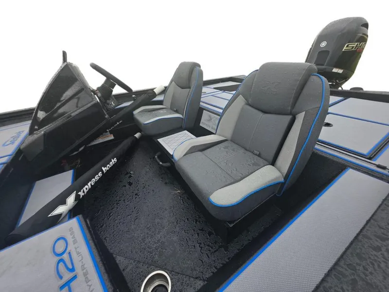 Slide: The Image of 2026 Xpress H20 Bass boat on a trailer, showcasing hull and trailer details. - 9