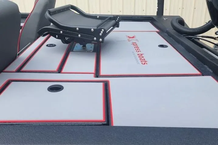 Slide: The Image of 2026 Xpress H20C Crappie Hyper-Lift Series boat deck with seating and storage compartments. - 10