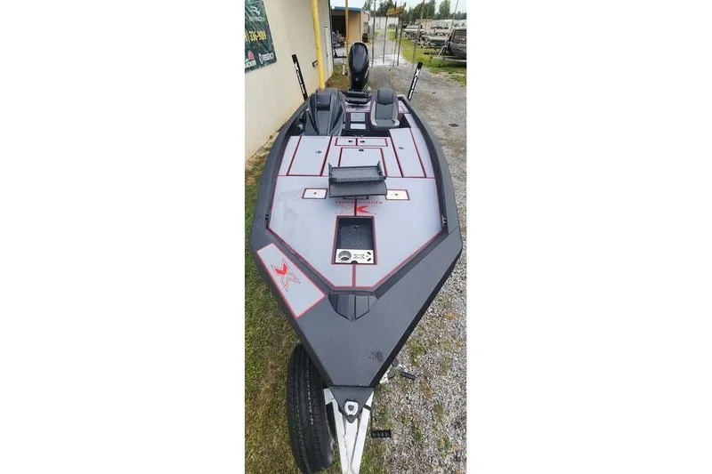 Slide: The Image of 2026 Xpress H20C Crappie Hyper-Lift Series boat, sleek design, gray and red accents. - 15