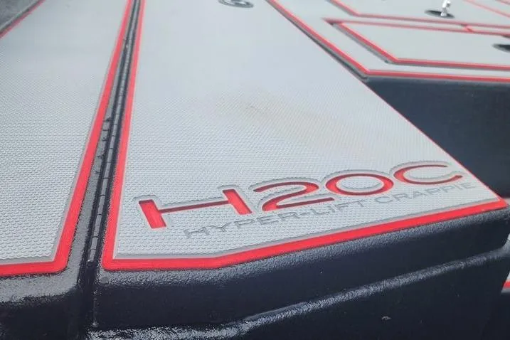 Slide: The Image of 2026 Xpress H20C Crappie Hyper-Lift Series boat deck with red accents. - 18