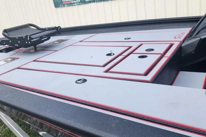 Slide: The Image of 2026 Xpress H20C Crappie Hyper-Lift Series boat deck with storage compartments. - 19