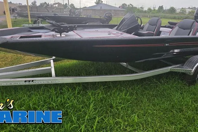 Slide: The Image of 2026 Xpress H20C Crappie Hyper-Lift Series boat on trailer, displayed outdoors. - 4