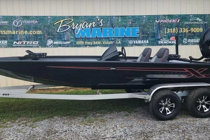 Slide: The Image of 2026 Xpress H20C Crappie Hyper-Lift Series boat on trailer at Bryan's Marine. - 6