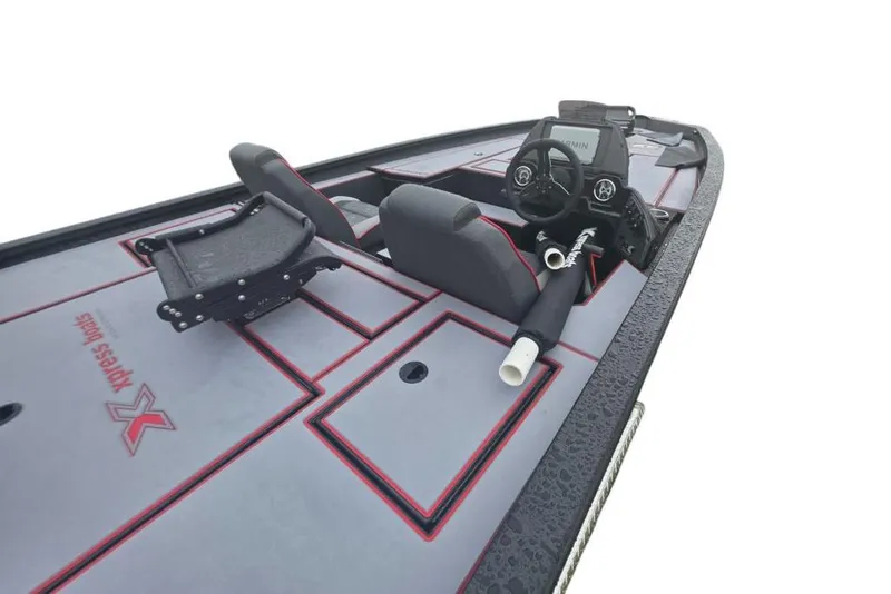Slide: The Image of 2026 Xpress H20C Crappie Hyper-Lift Series boat interior with steering console and seating. - 7