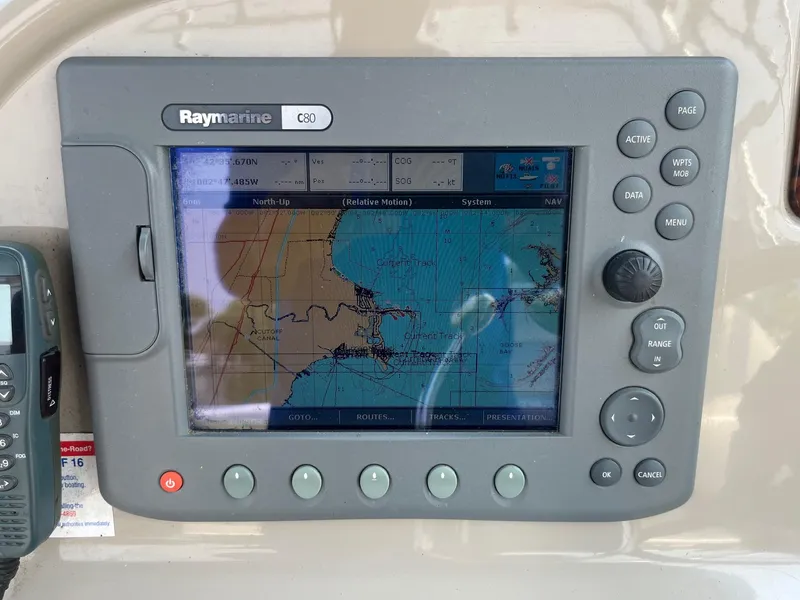 Slide: The Image of Raymarine C80 navigation display on 2007 Sea Ray 290 Amberjack boat dashboard. - 14