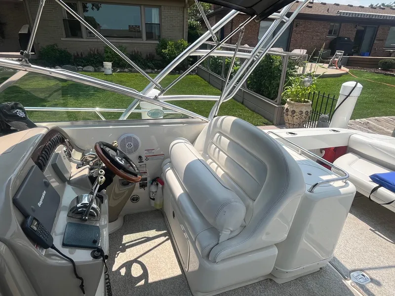 Slide: The Image of 2007 Sea Ray 290 Amberjack boat interior with helm, seating, and controls. - 16
