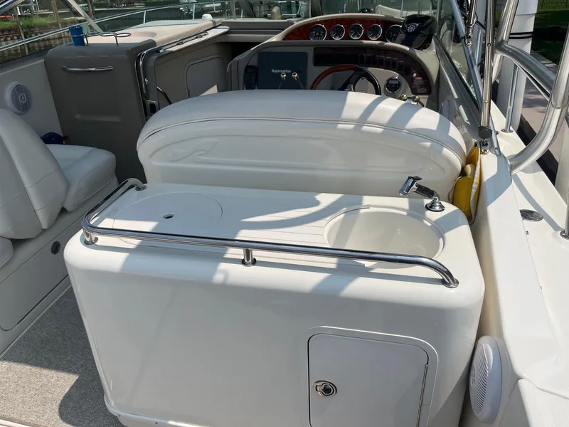 Slide: The Image of 2007 Sea Ray 290 Amberjack boat interior with helm, seating, and sink area. - 20