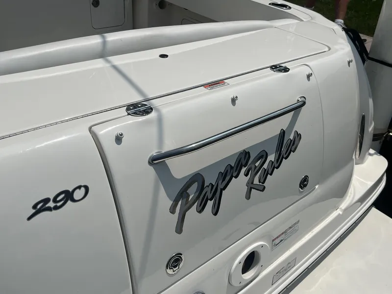 Slide: The Image of 2007 Sea Ray 290 Amberjack boat with "Papa Rules" name on the stern. - 8