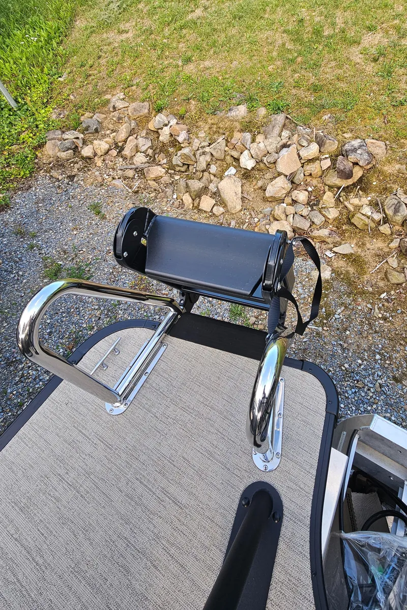 Slide: The Image of 2025 Godfrey MC255 SD boat ladder and platform on gravel and grass background. - 13