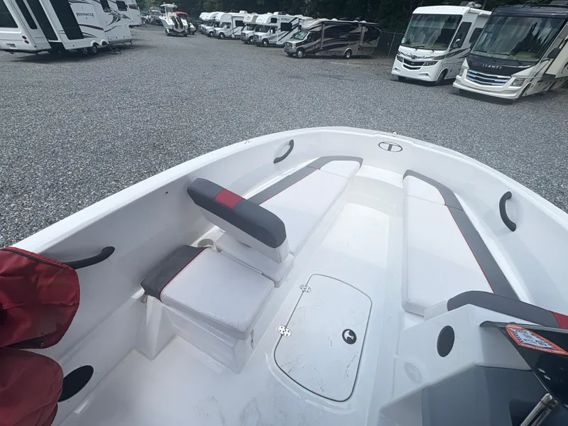 Slide: The Image of Dashboard of a 2021 Tahoe T16 boat with gauges and control switches. - 7