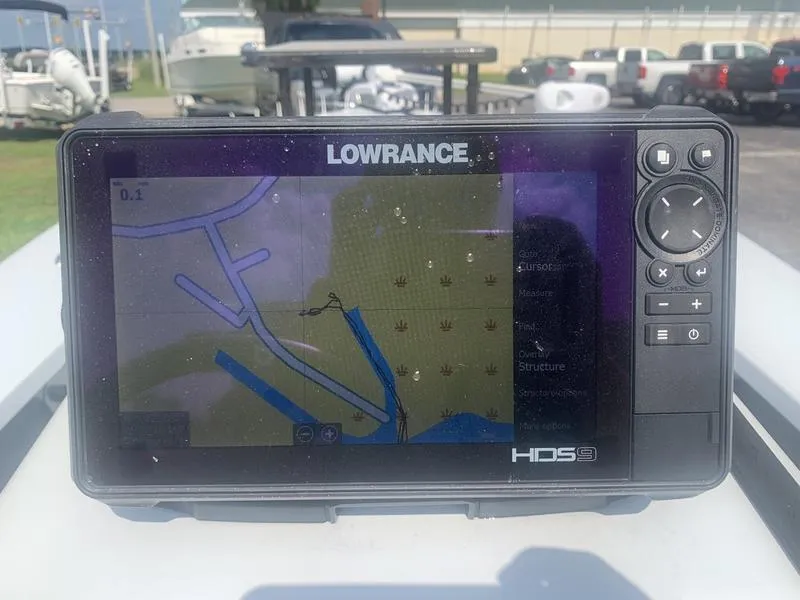 Slide: The Image of Lowrance HDS9 marine GPS displaying a nautical map on a Custom Biscayne 2018 boat. - 14