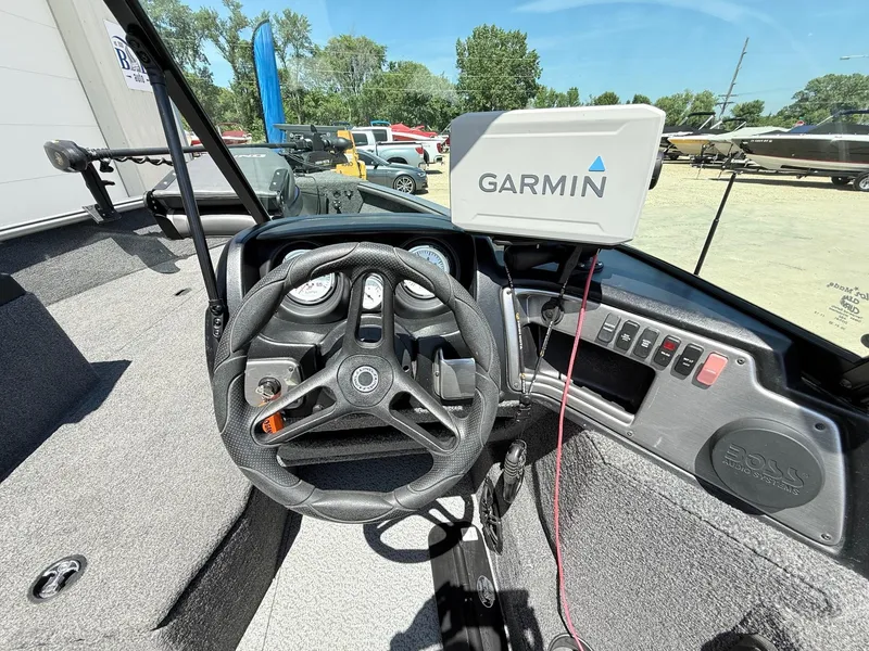 Slide: The Image of 2020 Lund 1775 Impact boat dashboard with Garmin GPS and steering wheel. - 17