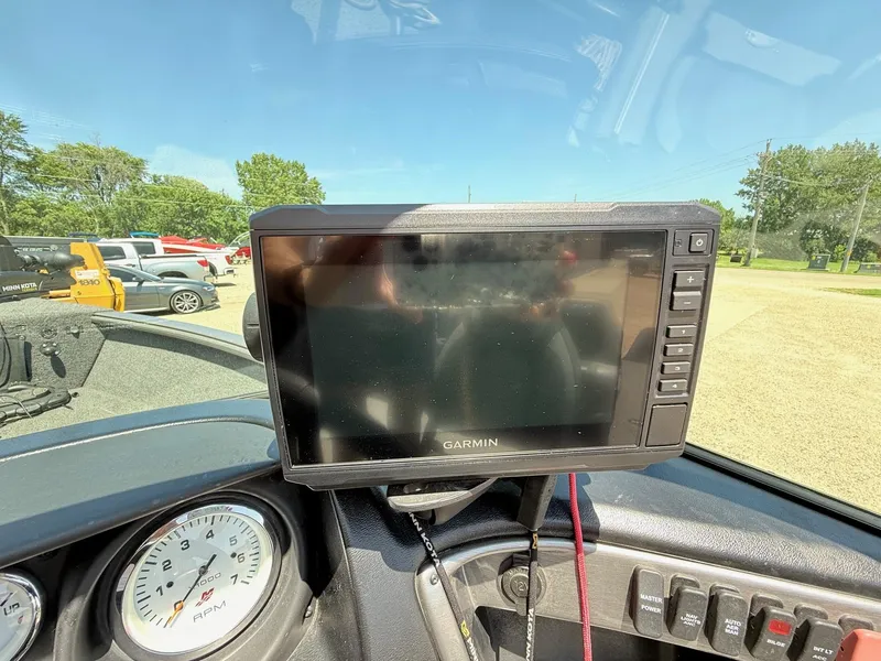 Slide: The Image of Garmin GPS device on 2020 Lund 1775 Impact boat dashboard, sunny day background. - 21