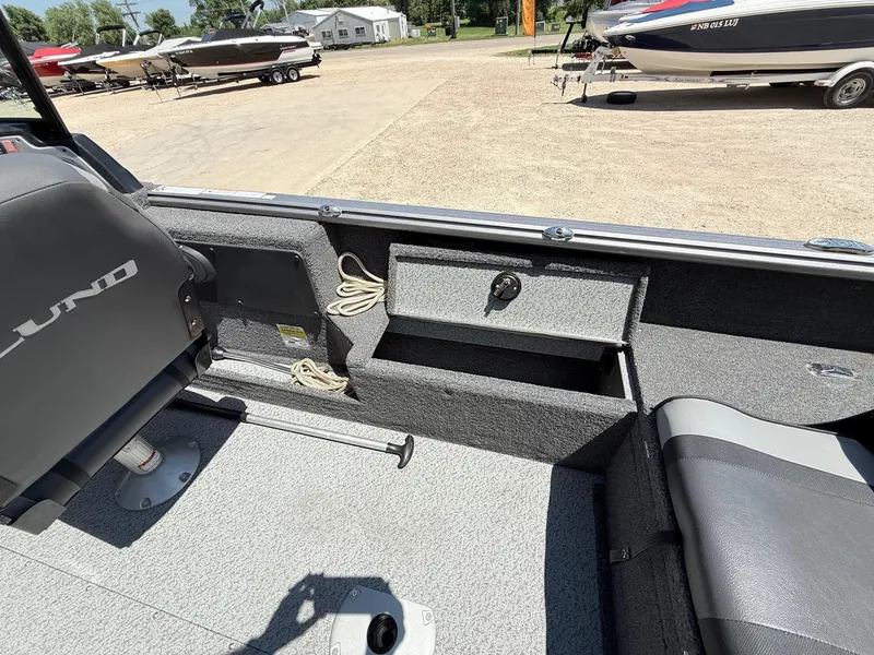 Slide: The Image of 2020 Lund 1775 Impact boat interior with storage compartment and seating. - 24