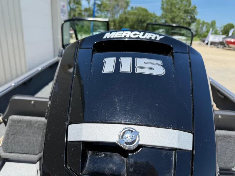 Slide: The Image of Mercury 115 outboard motor on 2020 Lund 1775 Impact boat, sunny day background. - 7
