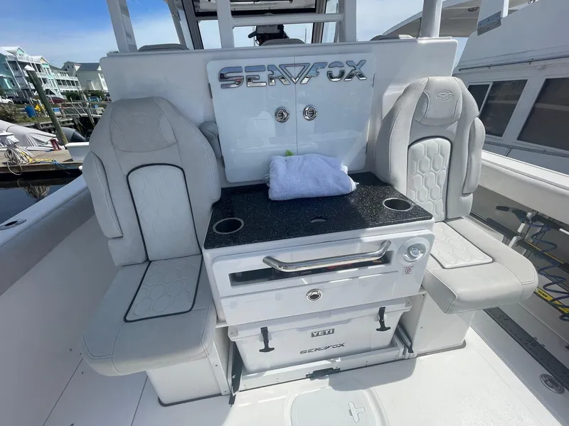 Slide: The Image of 2022 Sea Fox 368 Commander boat interior with seating and storage. - 18