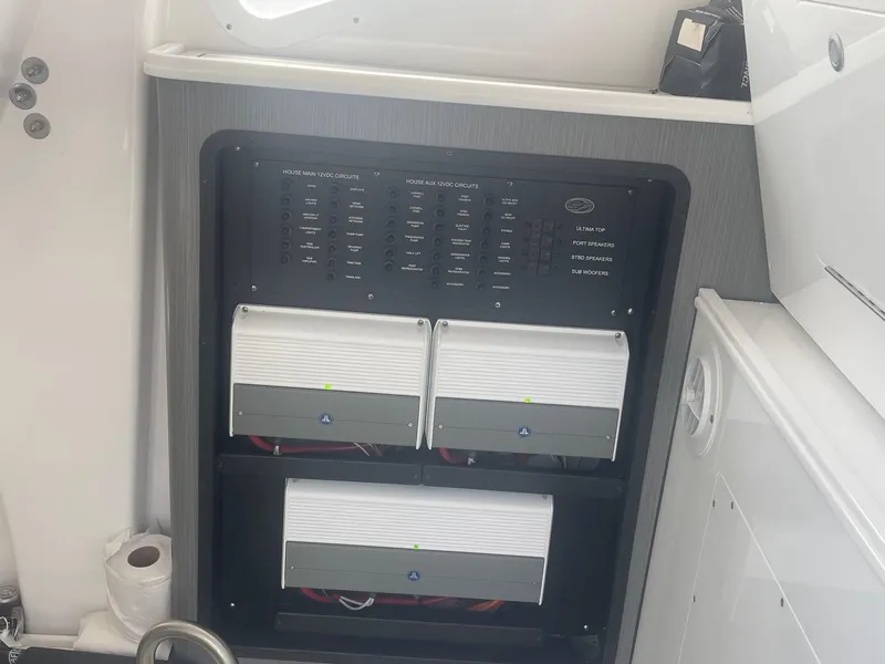 Slide: The Image of Electrical panel of 2022 Sea Fox 368 Commander boat with circuit breakers and amplifiers. - 22