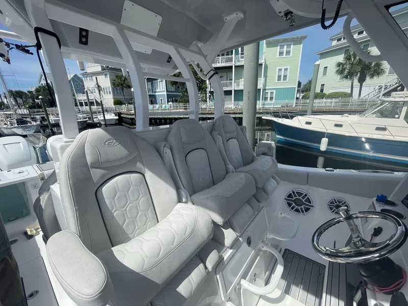 Slide: The Image of Interior of 2022 Sea Fox 368 Commander boat with plush seating and modern design. - 26