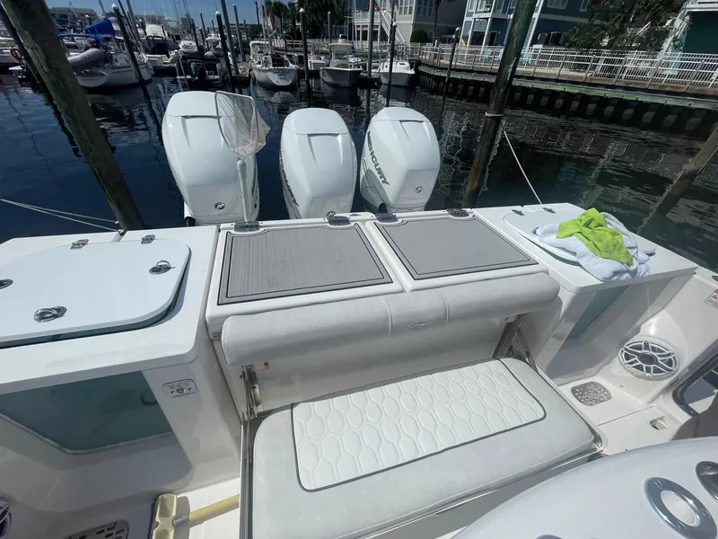 Slide: The Image of 2022 Sea Fox 368 Commander boat with triple Mercury engines docked at marina. - 34