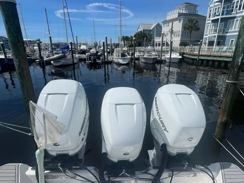 Slide: The Image of 2022 Sea Fox 368 Commander with triple Mercury engines docked at a marina. - 37