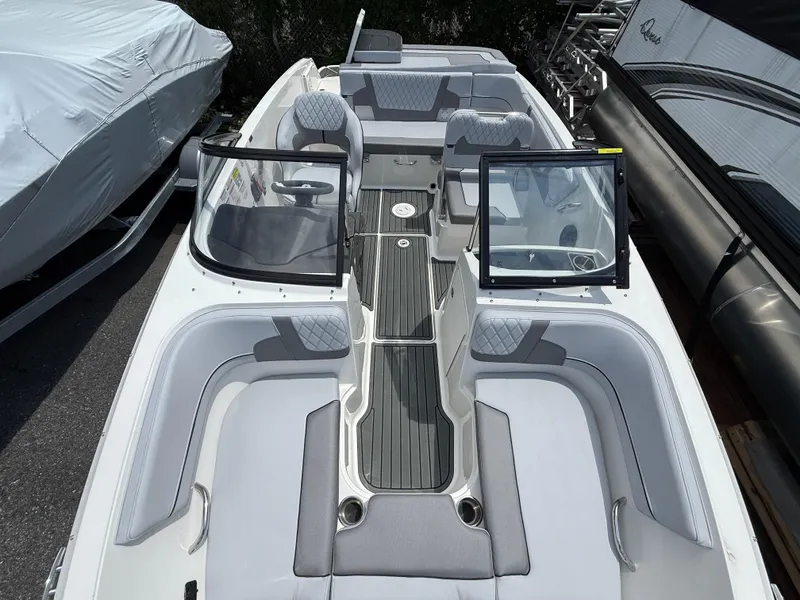 Slide: The Image of 2025 Bayliner VR5 Bowrider I/O with sleek seating and modern design. - 11
