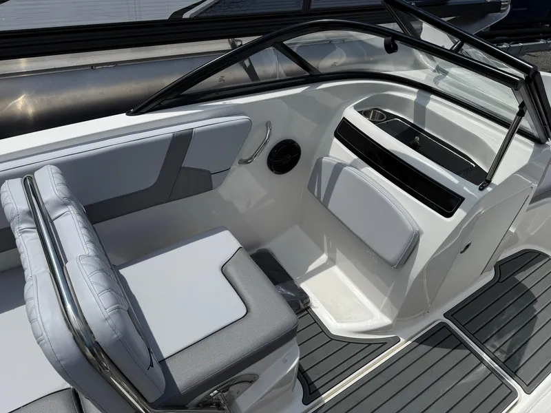 Slide: The Image of 2025 Bayliner VR5 Bowrider I/O interior with sleek seating and modern design. - 7