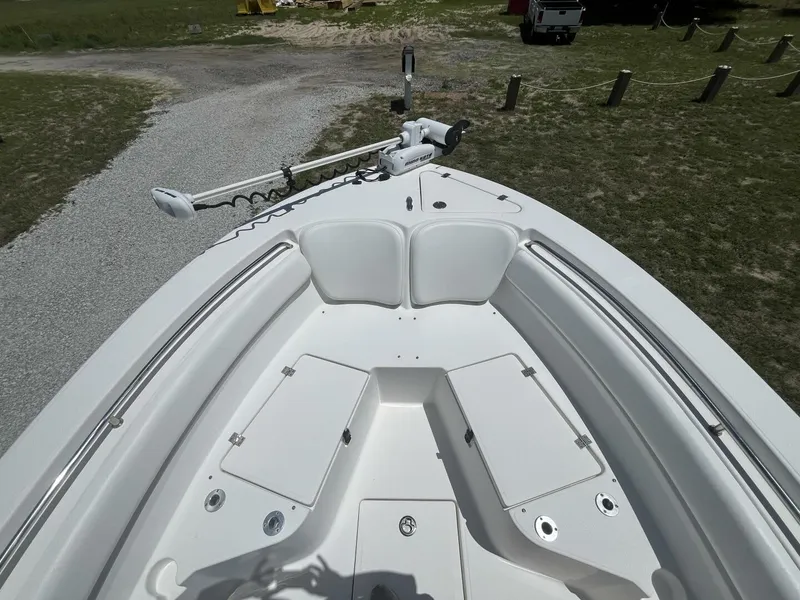 Slide: The Image of 2014 Sea Fox COMMANDER boat deck with storage compartments and trolling motor. - 11