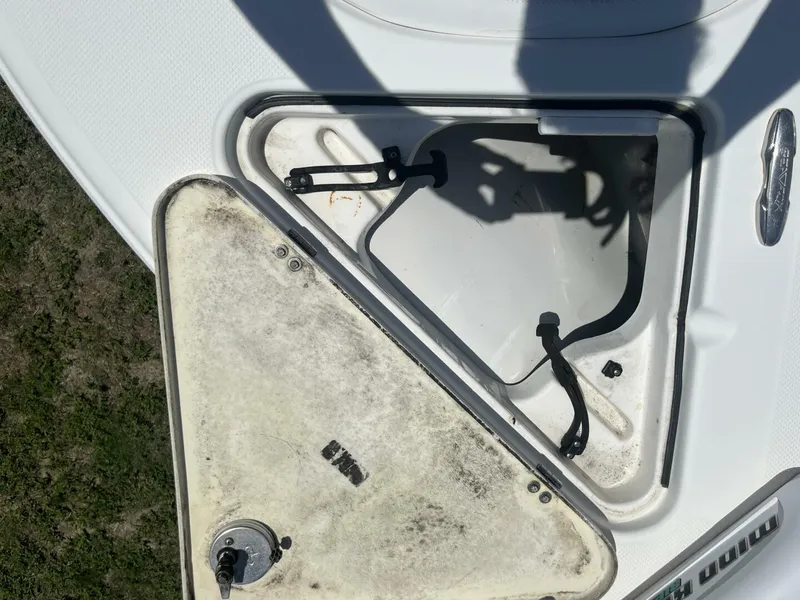 Slide: The Image of Open storage compartment on a 2014 Sea Fox COMMANDER boat. - 13