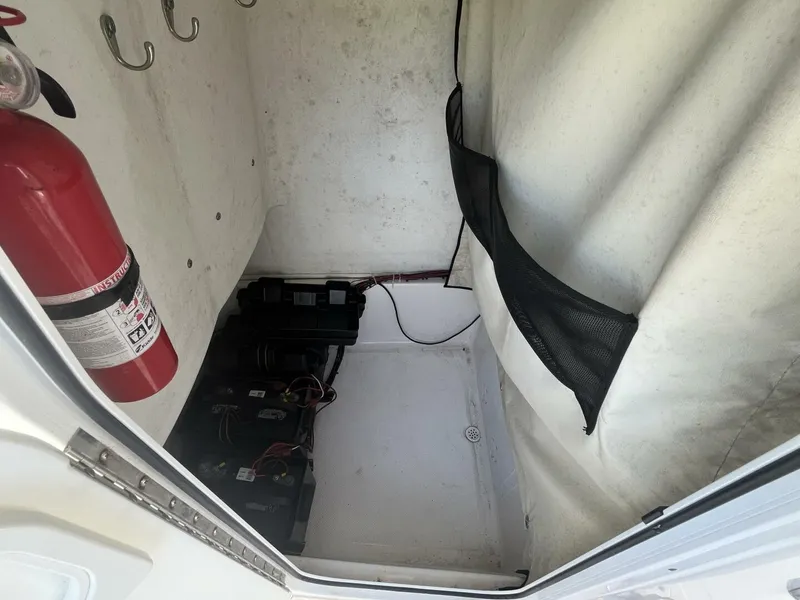 Slide: The Image of 2014 Sea Fox COMMANDER interior with fire extinguisher and battery compartment. - 21