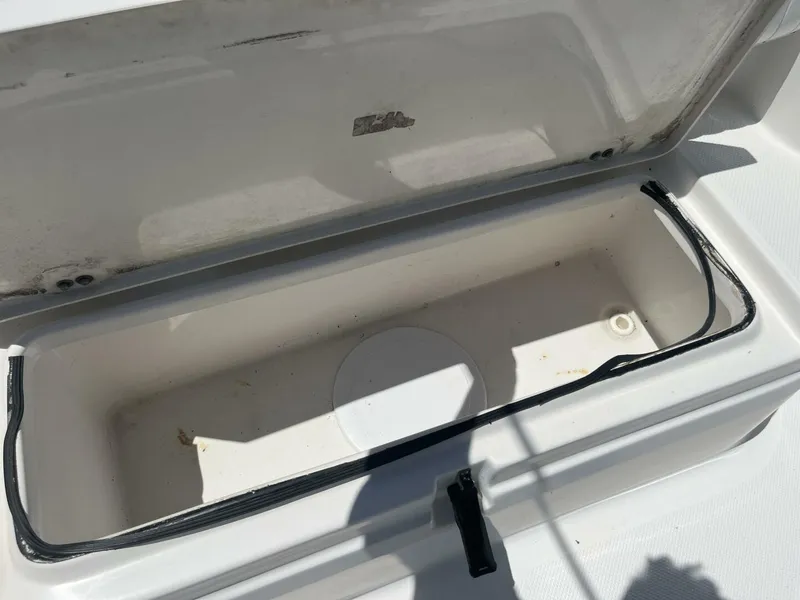 Slide: The Image of Open storage compartment on a 2014 Sea Fox COMMANDER boat. - 31