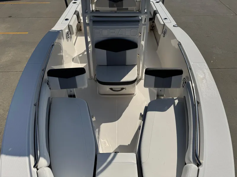 Slide: The Image of 2023 Robalo R202 Explorer boat interior with white seating and sleek design. - 15
