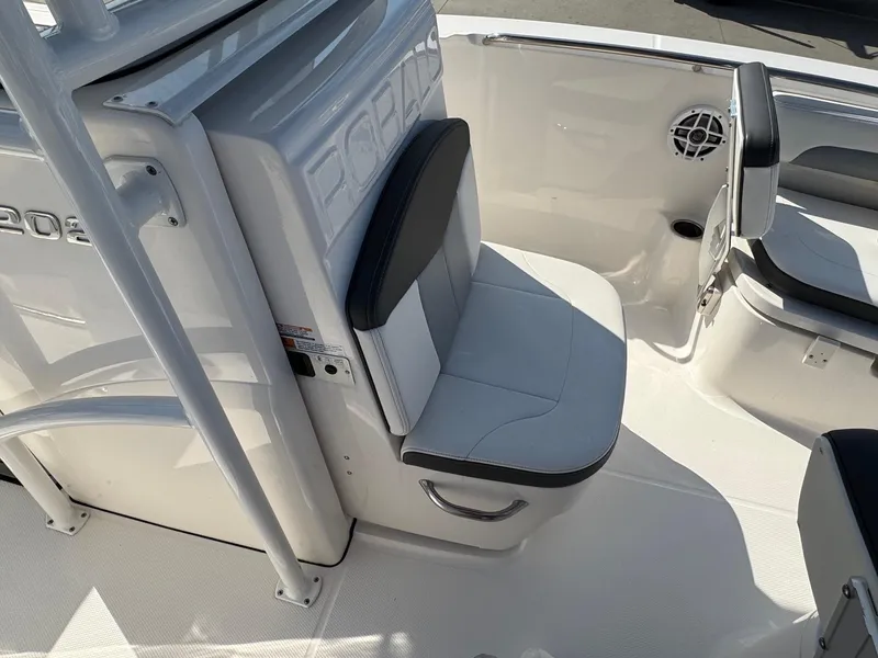 Slide: The Image of 2023 Robalo R202 Explorer boat interior with seating and speaker. - 16