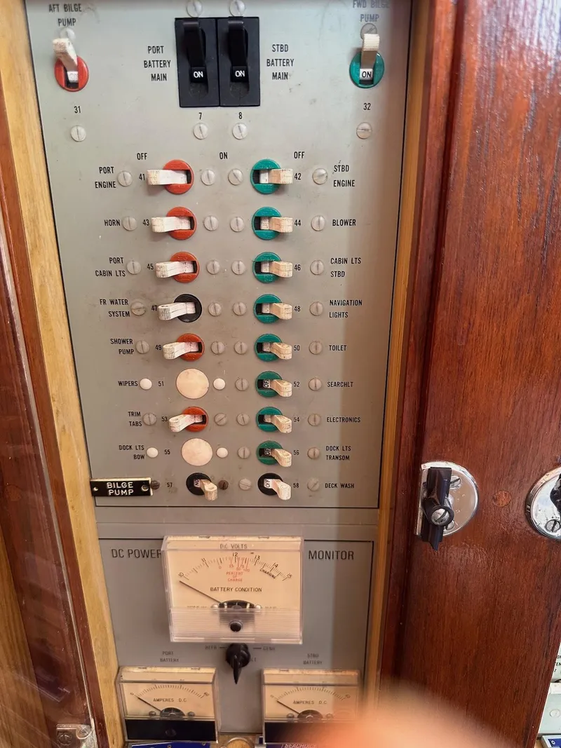 Slide: The Image of Electrical control panel on a 1978 Bertram 33 Convertible boat. - 12