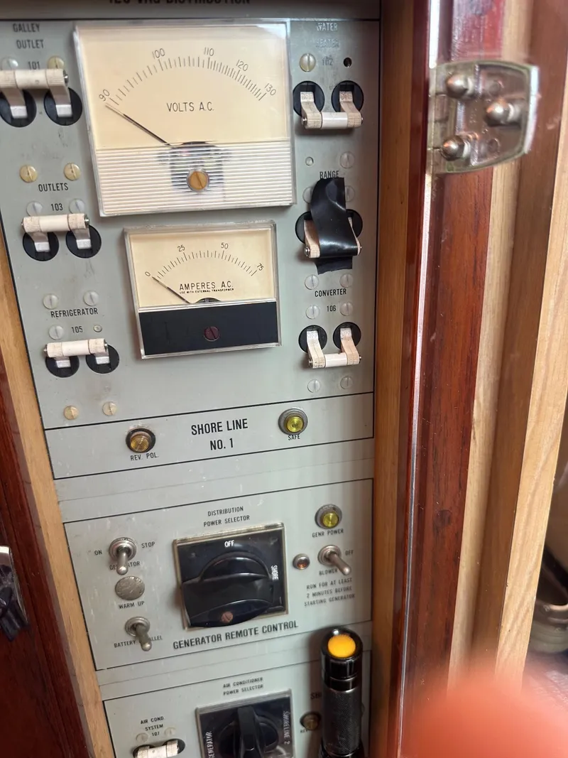 Slide: The Image of Electrical control panel on a 1978 Bertram 33 Convertible boat. - 13