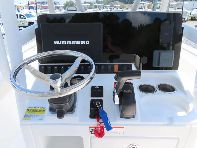 Slide: The Image of 2020 Sea Hunt Ultra 234 helm with Humminbird display and Yamaha controls. - 24
