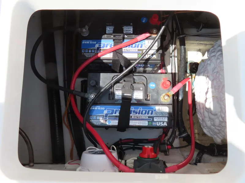 Slide: The Image of Battery compartment of 2020 Sea Hunt Ultra 234 boat with Precision batteries. - 40