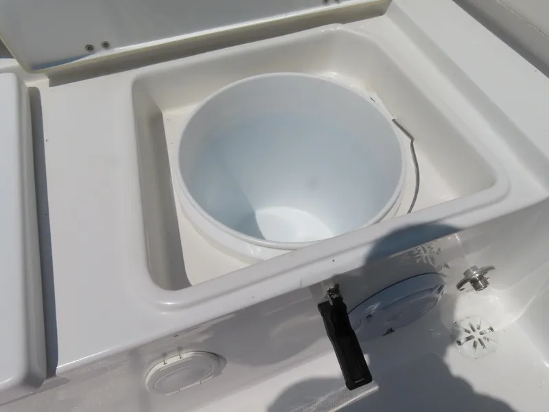 Slide: The Image of Livewell compartment on a 2020 Sea Hunt Ultra 234 boat. - 42